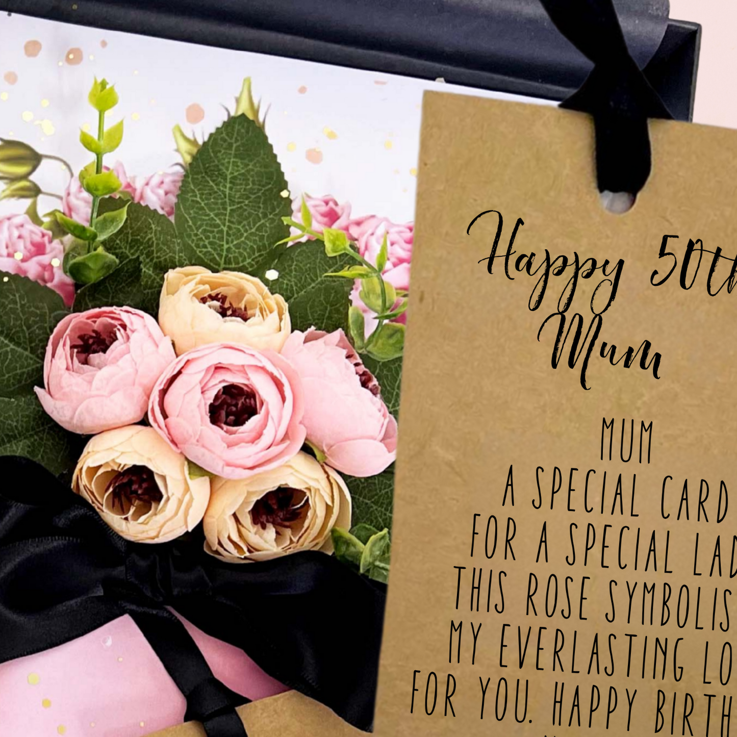 Bouquet of flowers with a 'Happy 50th Mum' card on a pink background
