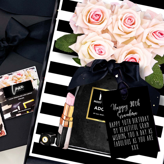 Happy 90th Birthday Grandma luxury Greeting card with lipstick, everlasting 3d flowers, and personalized message on a black and white striped background.