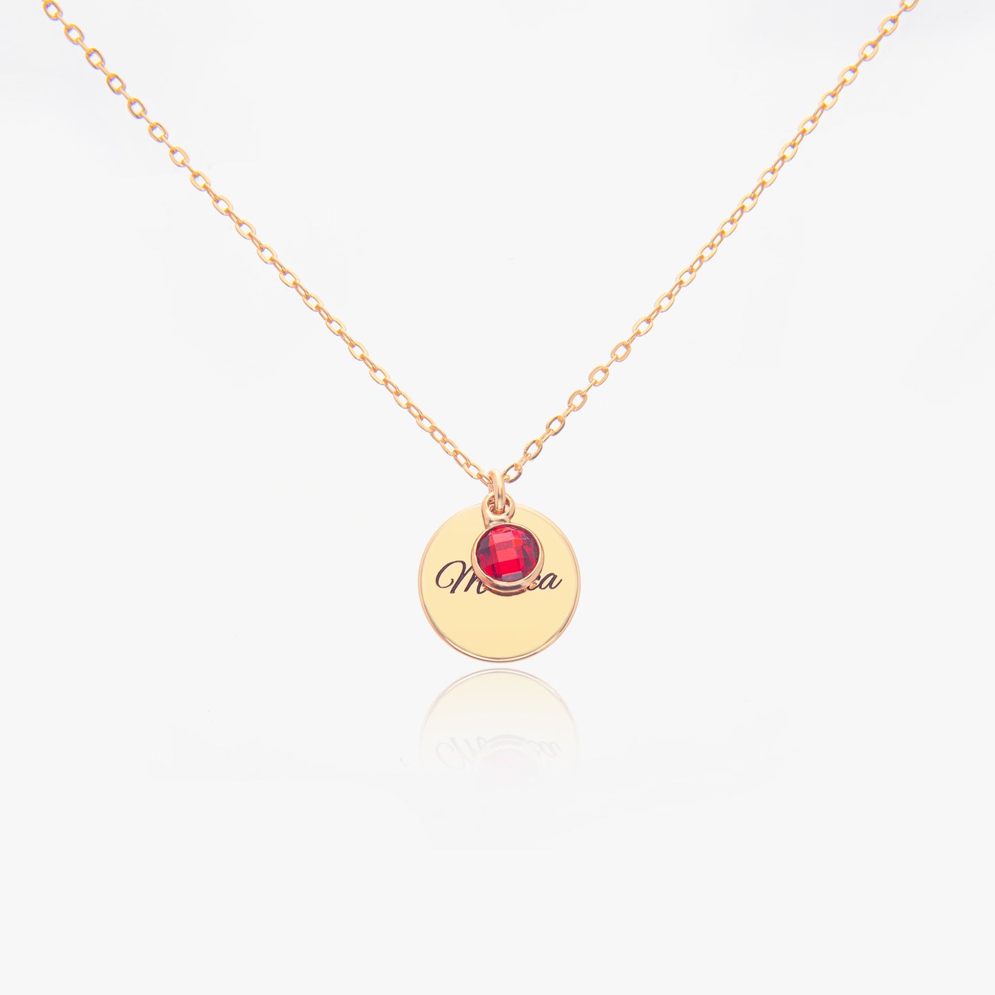 Gold Personalised July Birthstone necklace with a round pendant featuring a Ruby Gemsone (birthstone for July) and personalized engraved text on a white background