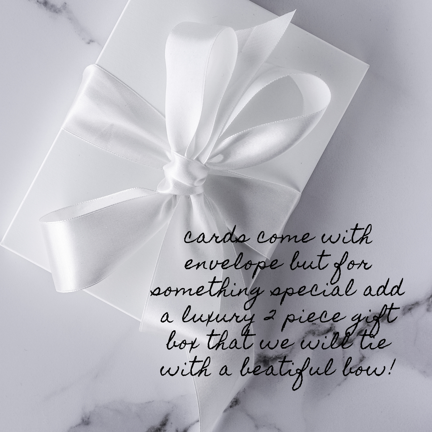 White gift boxed greetings cards with a decorative bow for birthday, anniversary, wedding and special occasions.