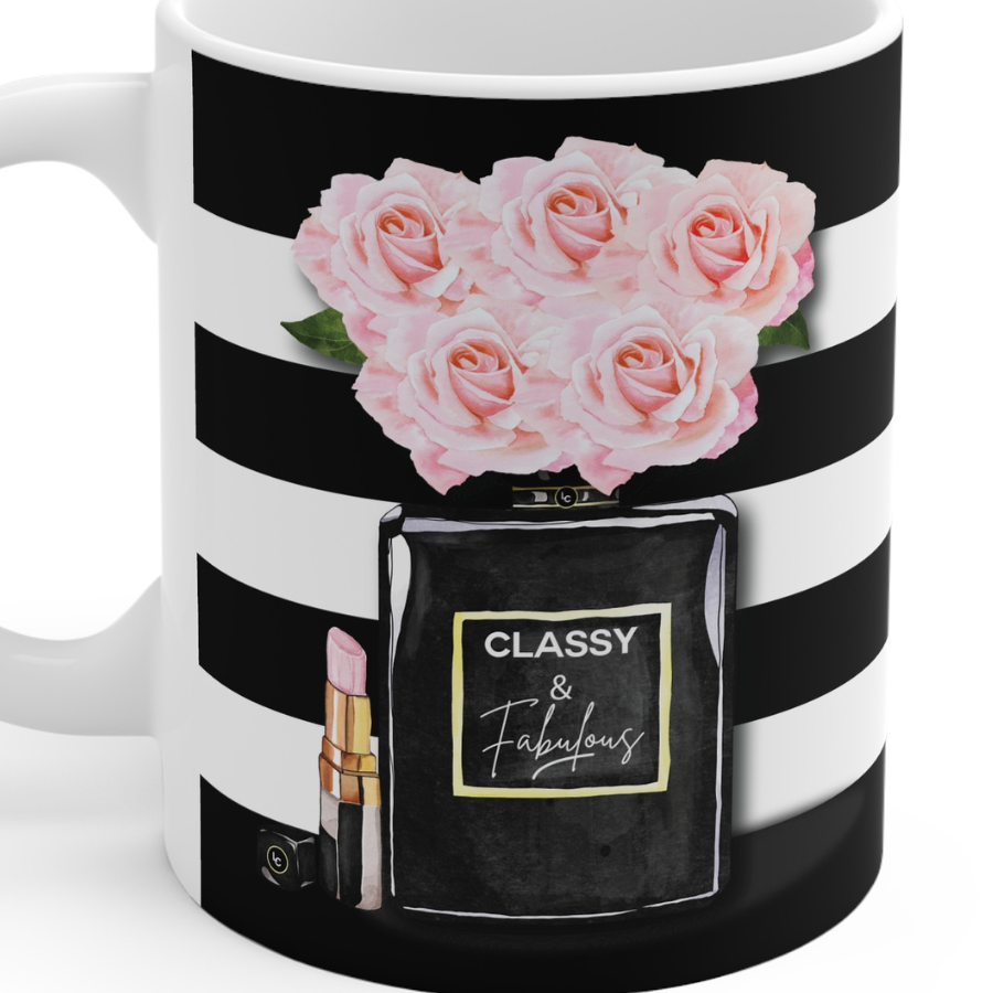Mug with black and white striped design, pink roses, and a perfume bottle graphic.