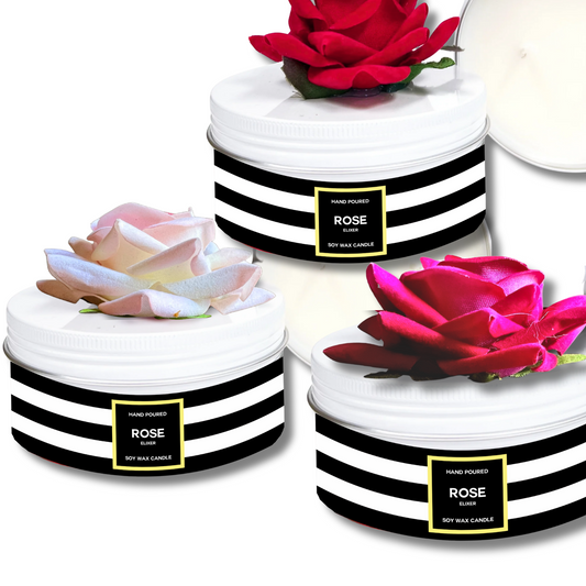 Three rose-scented candles in white tins with black and white striped lids on a white background where you choose the rose color