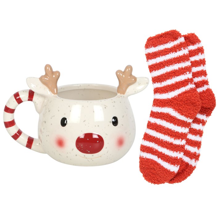 Reindeer mug with candy cane handle and red and white striped sock on a white background