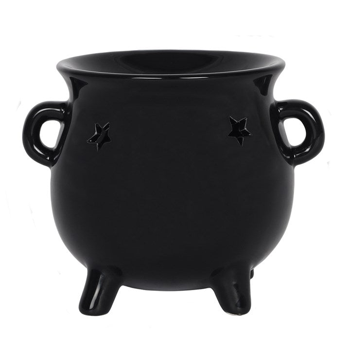 Black cauldron oil burner wax warmer with star designs on a white background