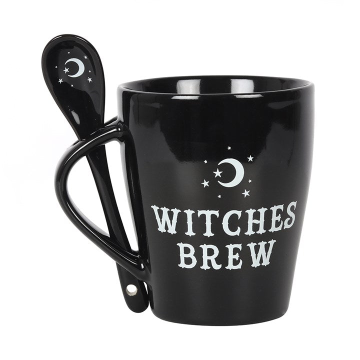 Black mug with 'Witches Brew' text and a matching spoon on a white background