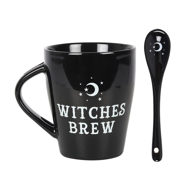 Black mug with 'Witches Brew' text and matching spoon on a white background