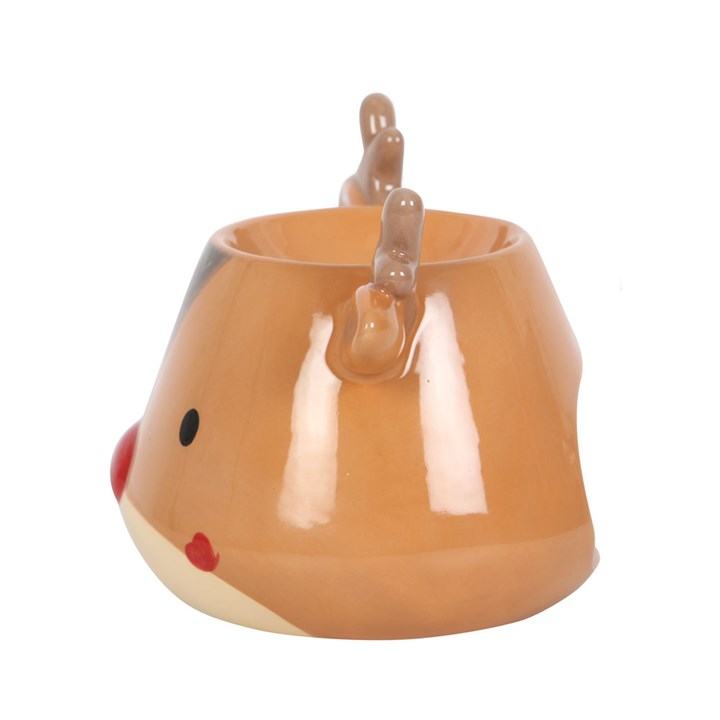 Ceramic oil burner shaped like a reindeer character with a white interior on a white background