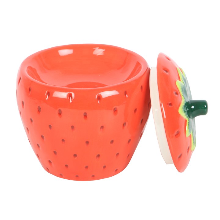 Ceramic strawberry-shaped oil burner wax warmer with a lid on a white background