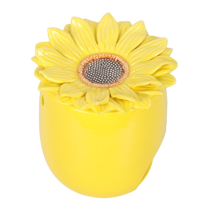 Yellow ceramic container shaped like a sunflower on a white background