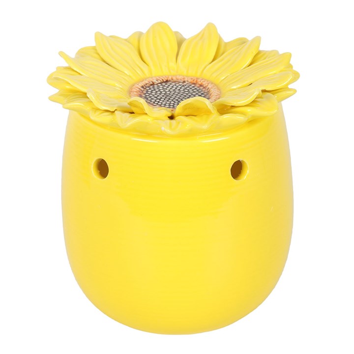 Yellow ceramic oil burner shaped like a sunflower on a white background
