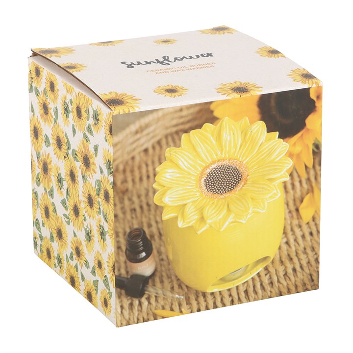 Yellow sunflower-shaped diffuser in a decorative box with sunflower pattern