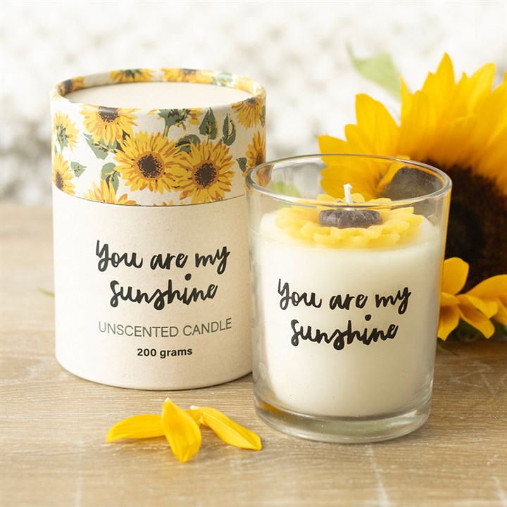 3rd Wedding Anniversary Sunflower Candle with 'You are my sunshine' text and sunflower-themed packaging on a wooden surface.