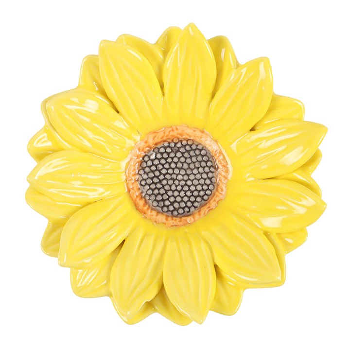 Yellow sunflower-shaped decorative item on a white background