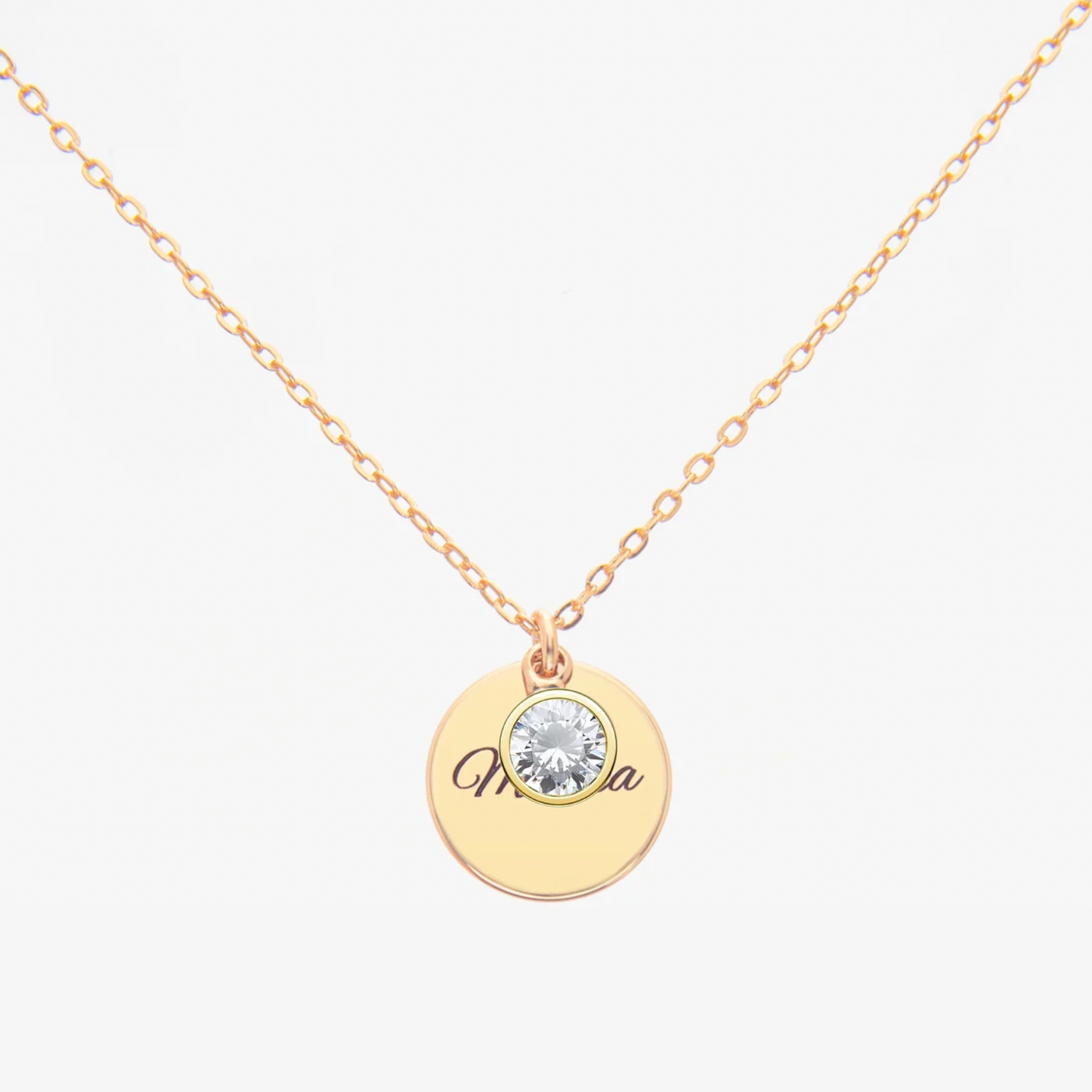 Gold Personalised April Birthstone necklace with a round pendant featuring a diamond (birthstone for April) and personalized engraved text on a white background