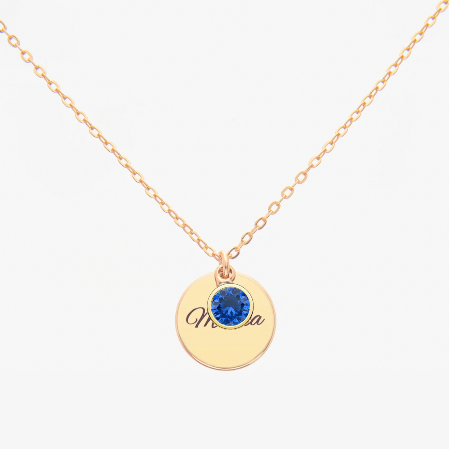 Gold Personalised Sapphire Birthstone necklace with a round pendant featuring a Sapphire (birthstone for September) and personalized engraved text on a white background