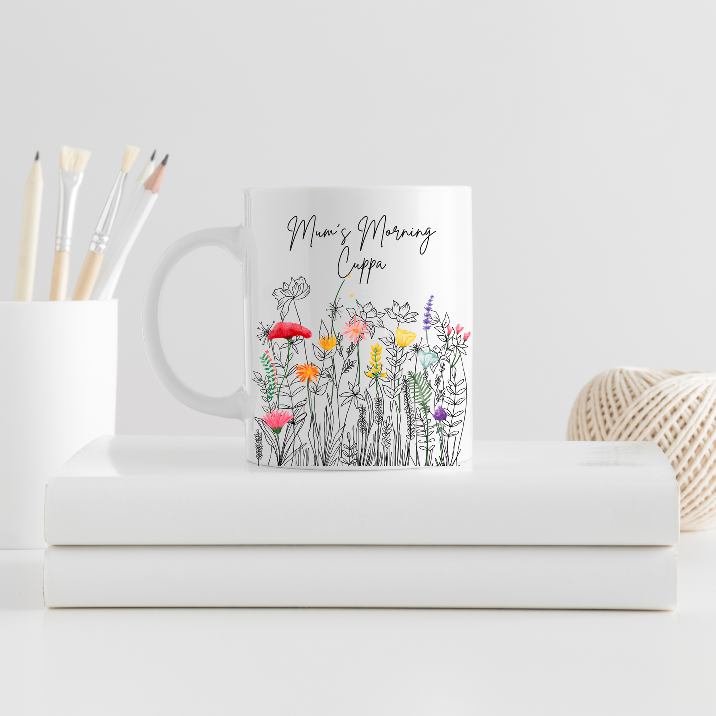 Personalised Bloom Mug with floral design and custom text on a white surface
