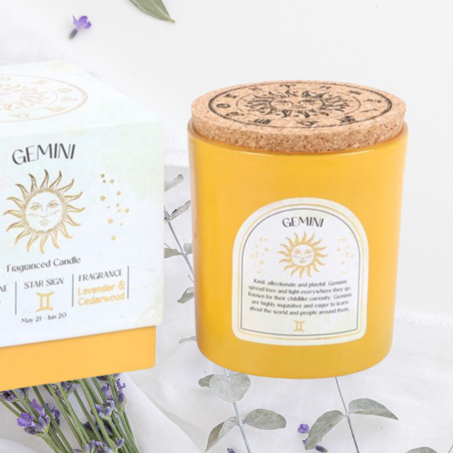 A yellow gemini 80th birthday candle, each with a matching box, representing different star signs of the zodiac.