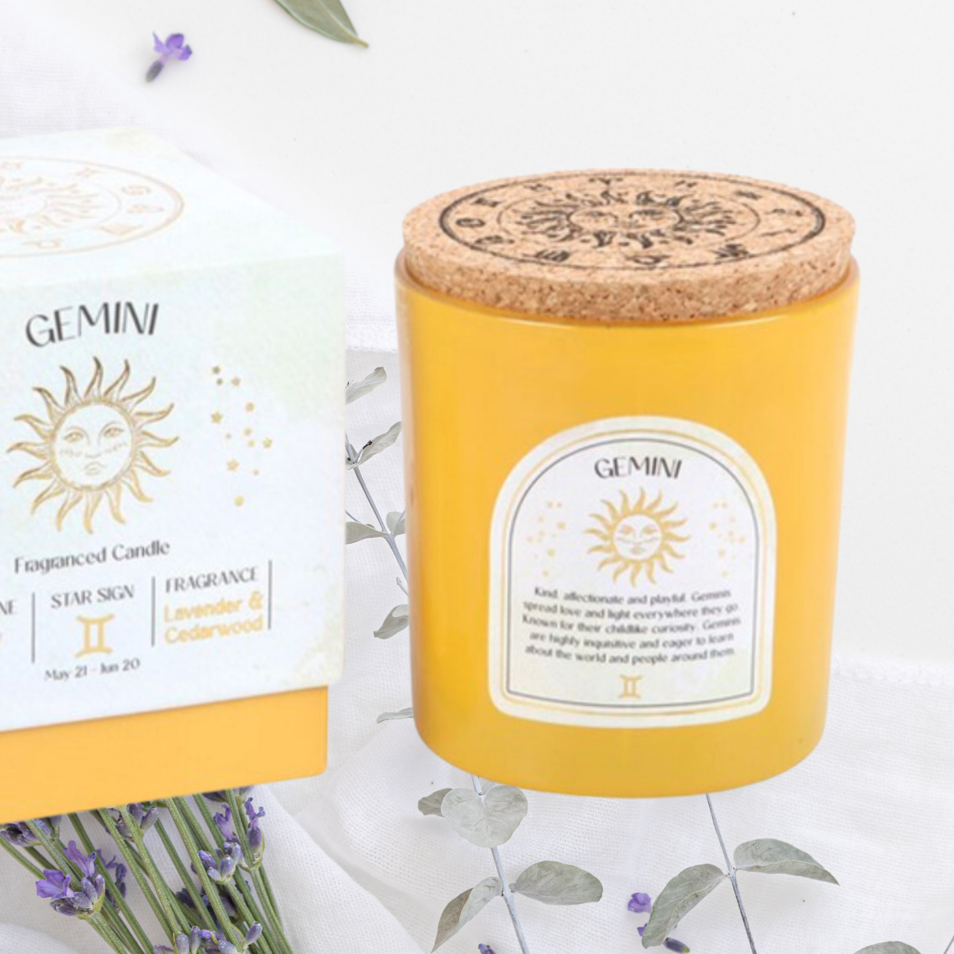 A yellow gemini 80th birthday candle, each with a matching box, representing different star signs of the zodiac.
