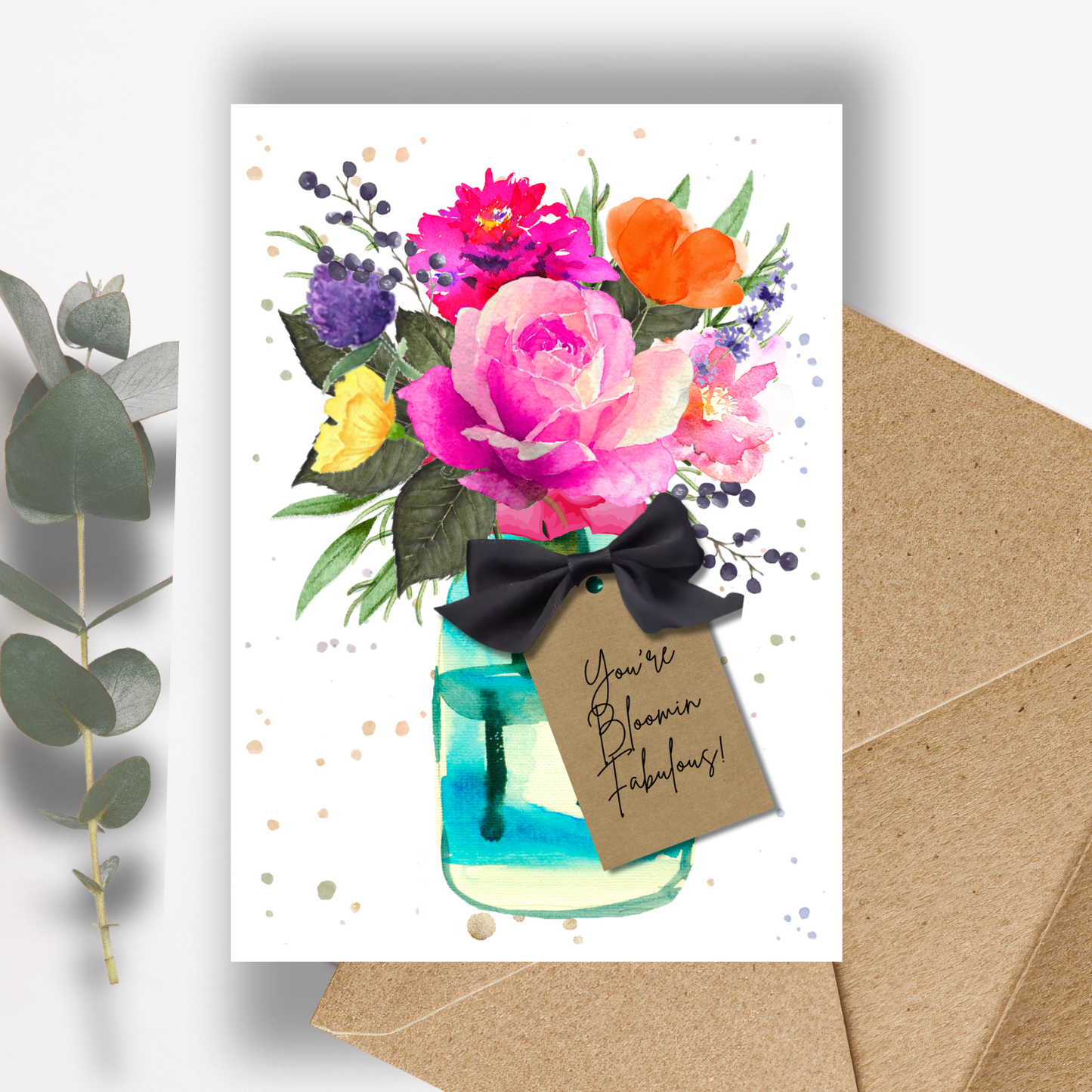 Birthday Greeting card with floral design and mason jar with hot pink watercolor rose, placed on a white background.Card reads 'You're Bloomin Fabulous!'