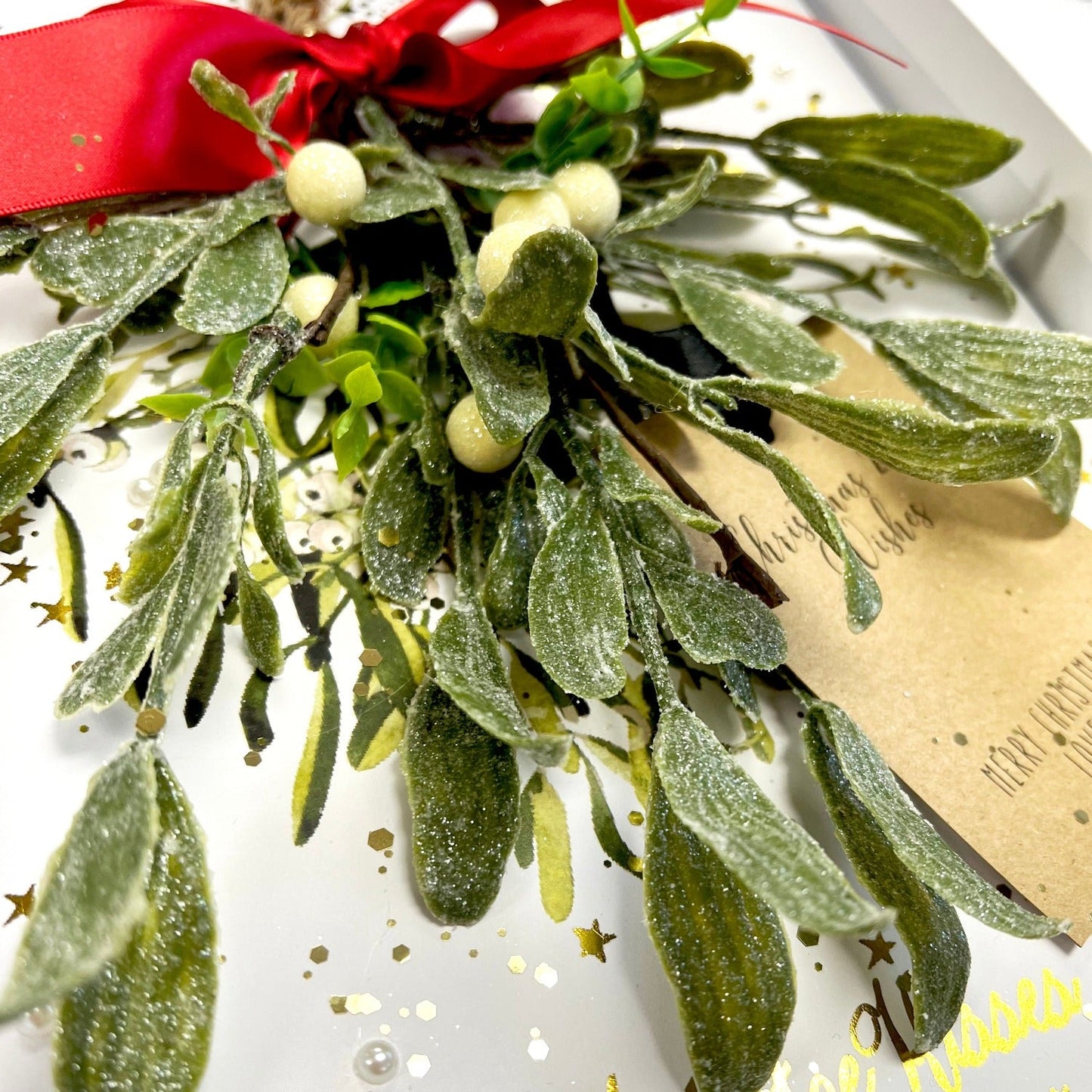 Scented personalised Mistletoe kisses christmas card | The Luxe Co