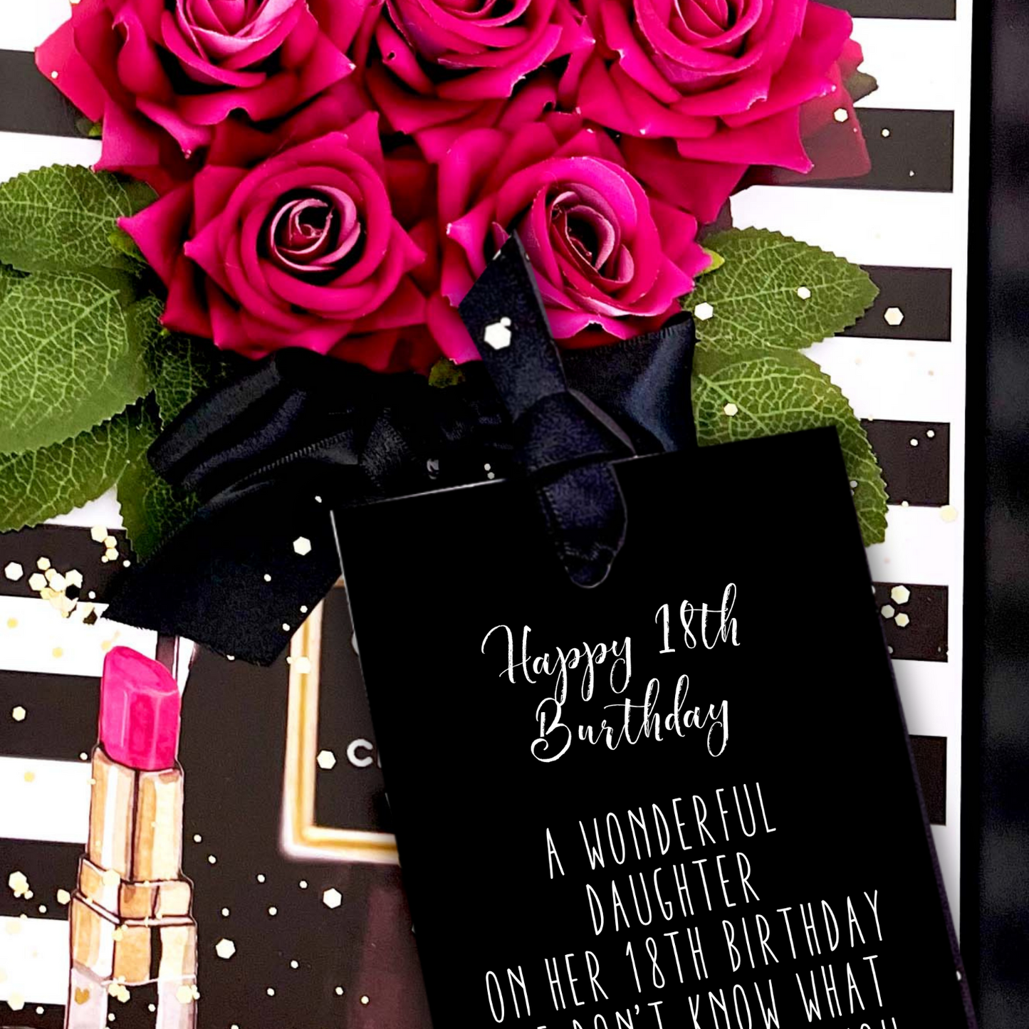 Hot Pink Bouquet of pink roses Luxury 18th Birthday card with a black gift bag and pink lipstick on a decorative background.