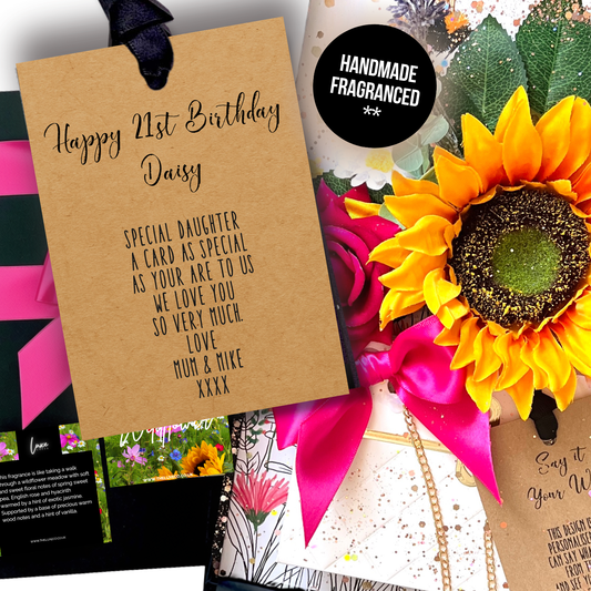 Momma Bloom Wildflower 21st Birthday Gift Boxed Card - A handmade daughter birthday card with bright pink ribbons, a silk yellow sunflower, green leaves, and handbag flower display fragranced in 'Wildflower' to wow the recipient as soon as they open it
