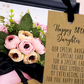 30th Birthday Daughter Card with a Bouquet of silk flowers with a 'Happy 30th Daughter' card on a pink background