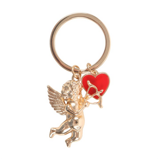 Gold keychain with cherub and red heart charm on a white background