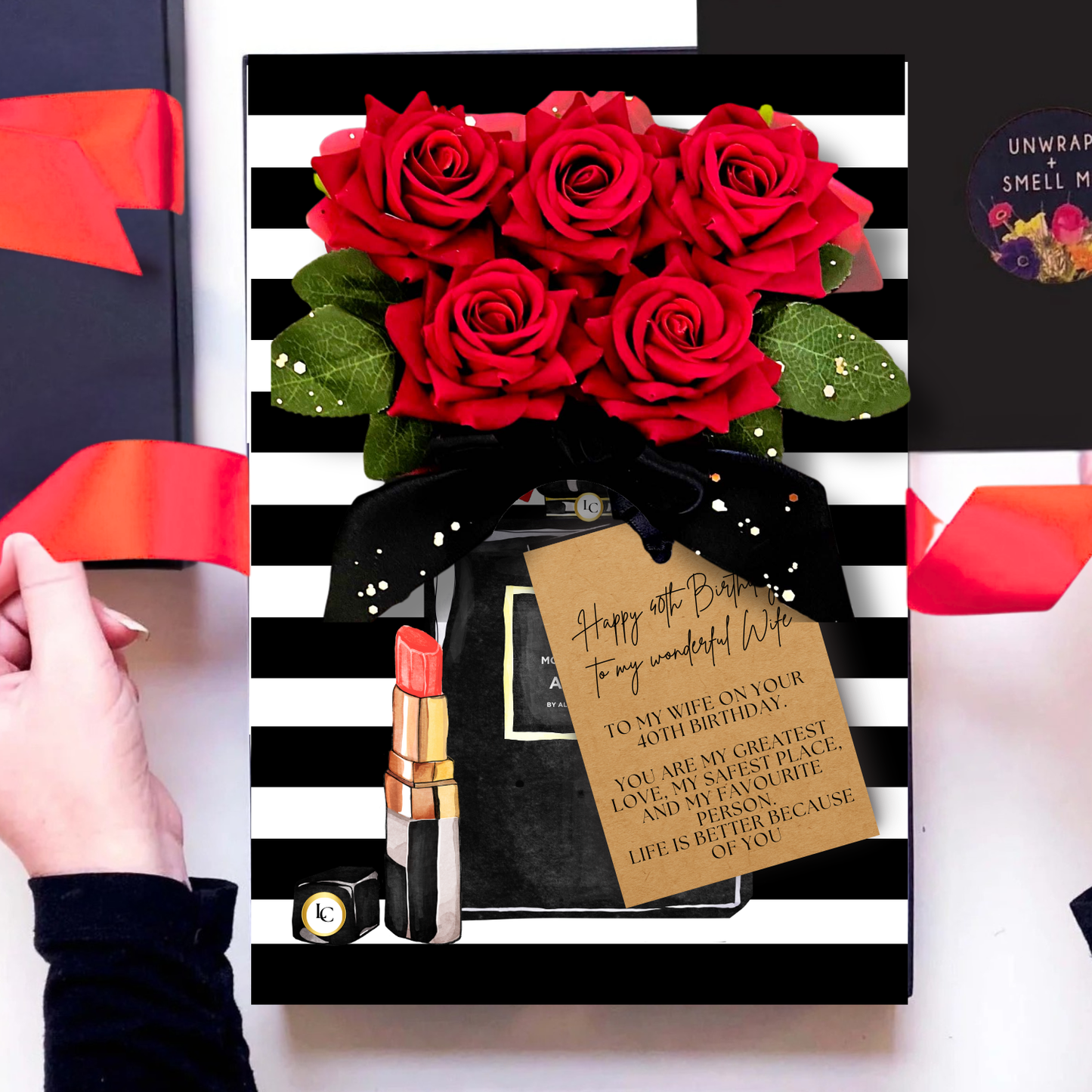 Gift boxed 40th Wife Birthday card handmade with red roses, lipstick, on a black and white striped background, personalised with wording and scented in rose perfume