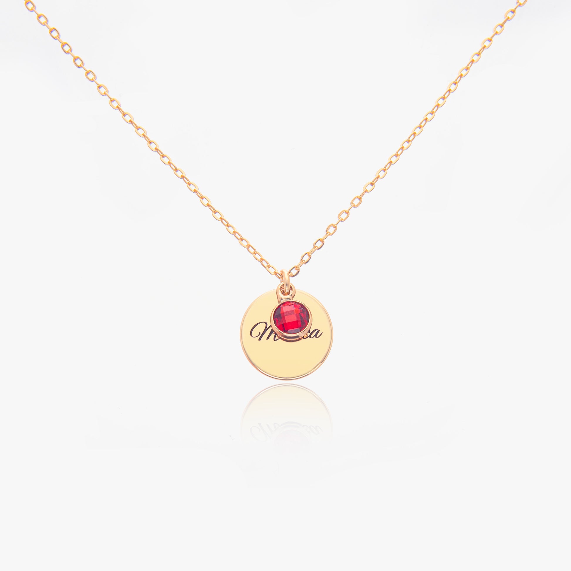 Gold Personalised July Birthstone necklace with a round pendant featuring a Ruby Gemsone (birthstone for July) and personalized engraved text on a white background