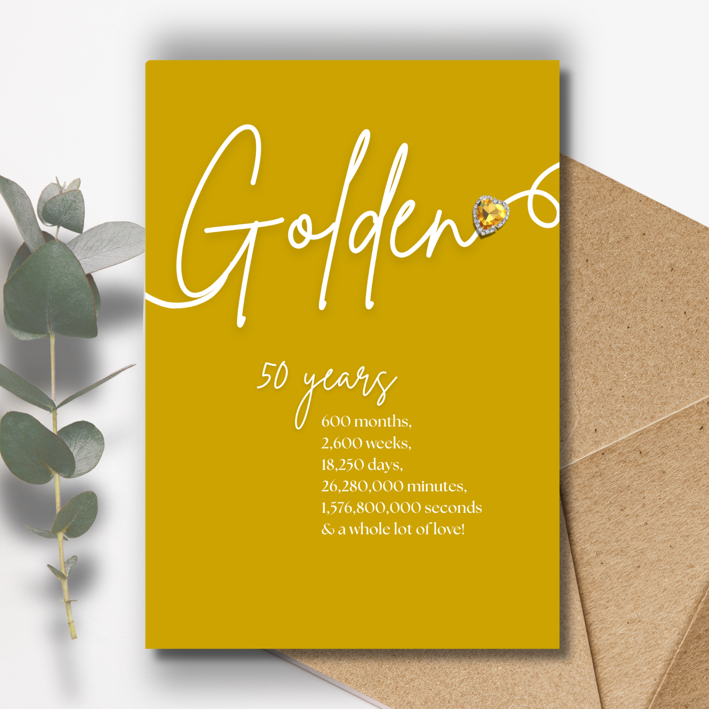 Handmade A5 Swirly Sparkly Diamante Golden Heart Anniversary Card Yellow card with 'Golden 50' text and an envelope on a white background