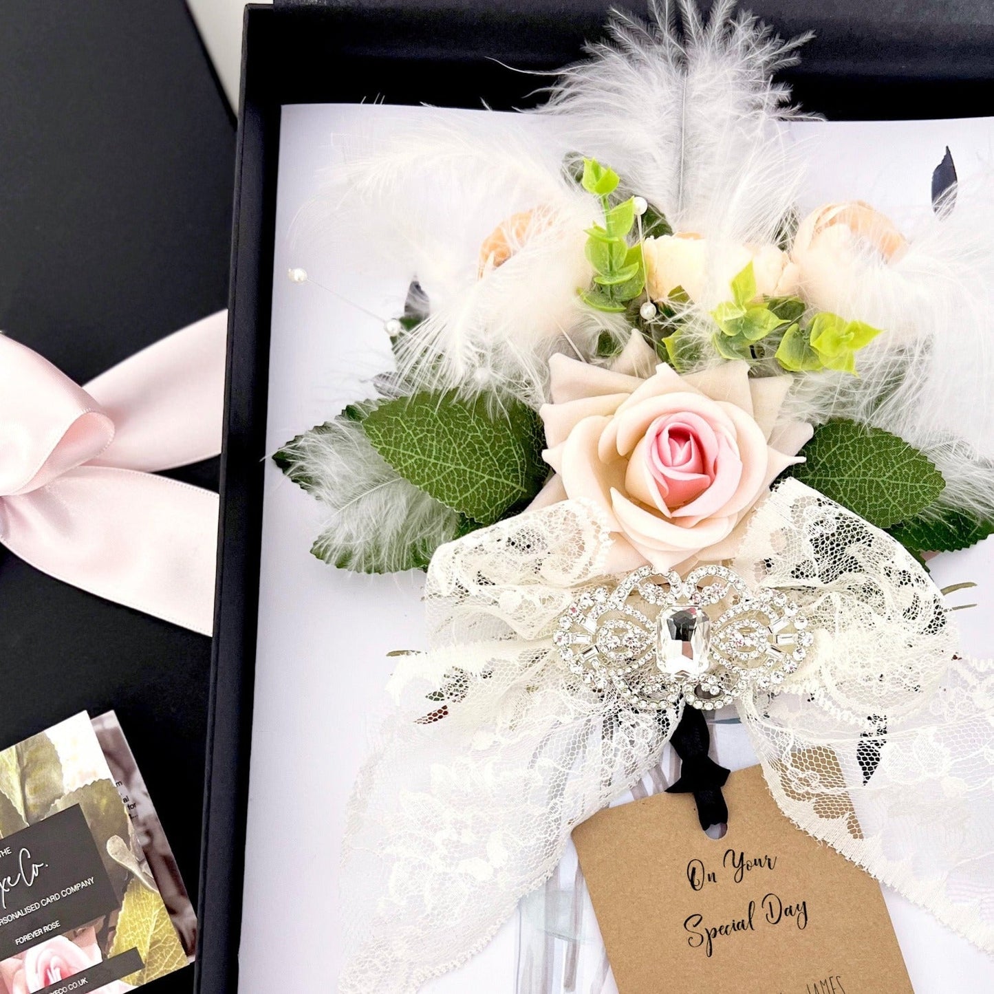 Luxurious 60th Diamond anniversary gifts - with the designer edge. Feathers, sparkly crystal and roses
