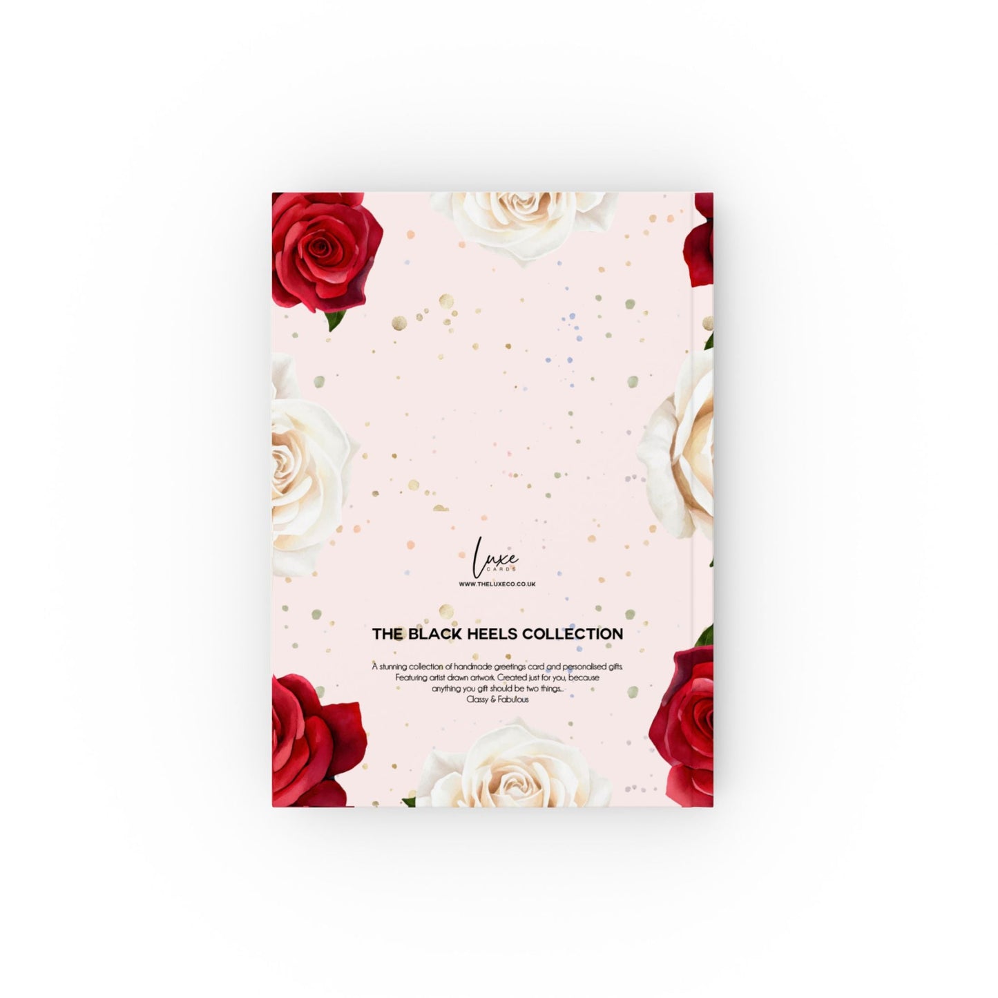 Back of the blush and black heels journal with red and ivory roses on a light pink background