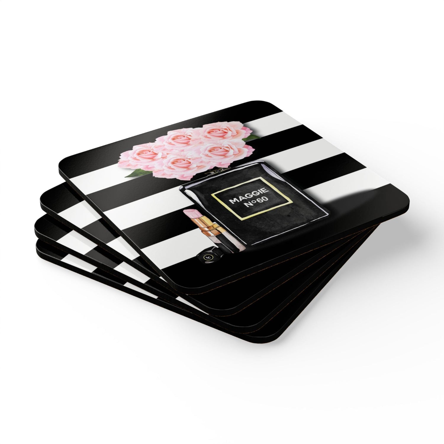 Set of black and white striped 60th birthday coasters with floral and mask design on a white background