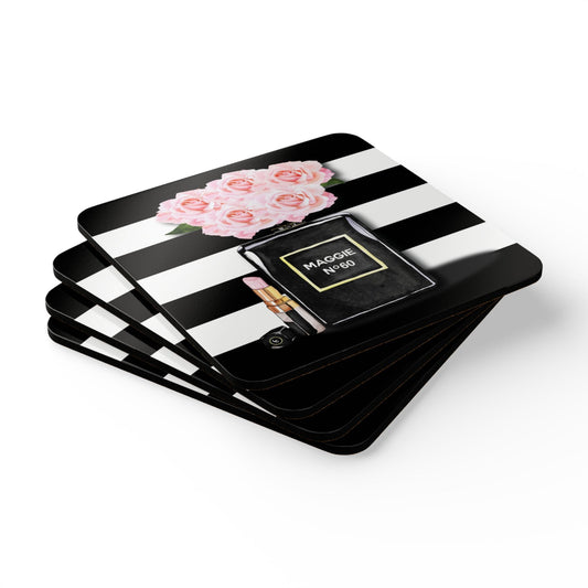 Set of black and white striped 60th birthday coasters with floral and mask design on a white background