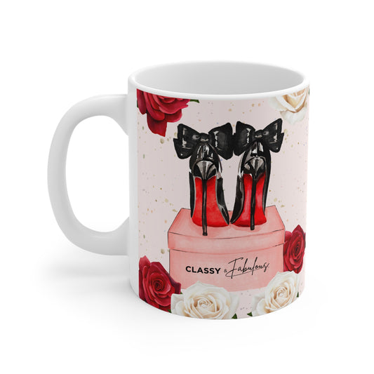 Mug with red and black high heels, black bows, and roses on a white background
