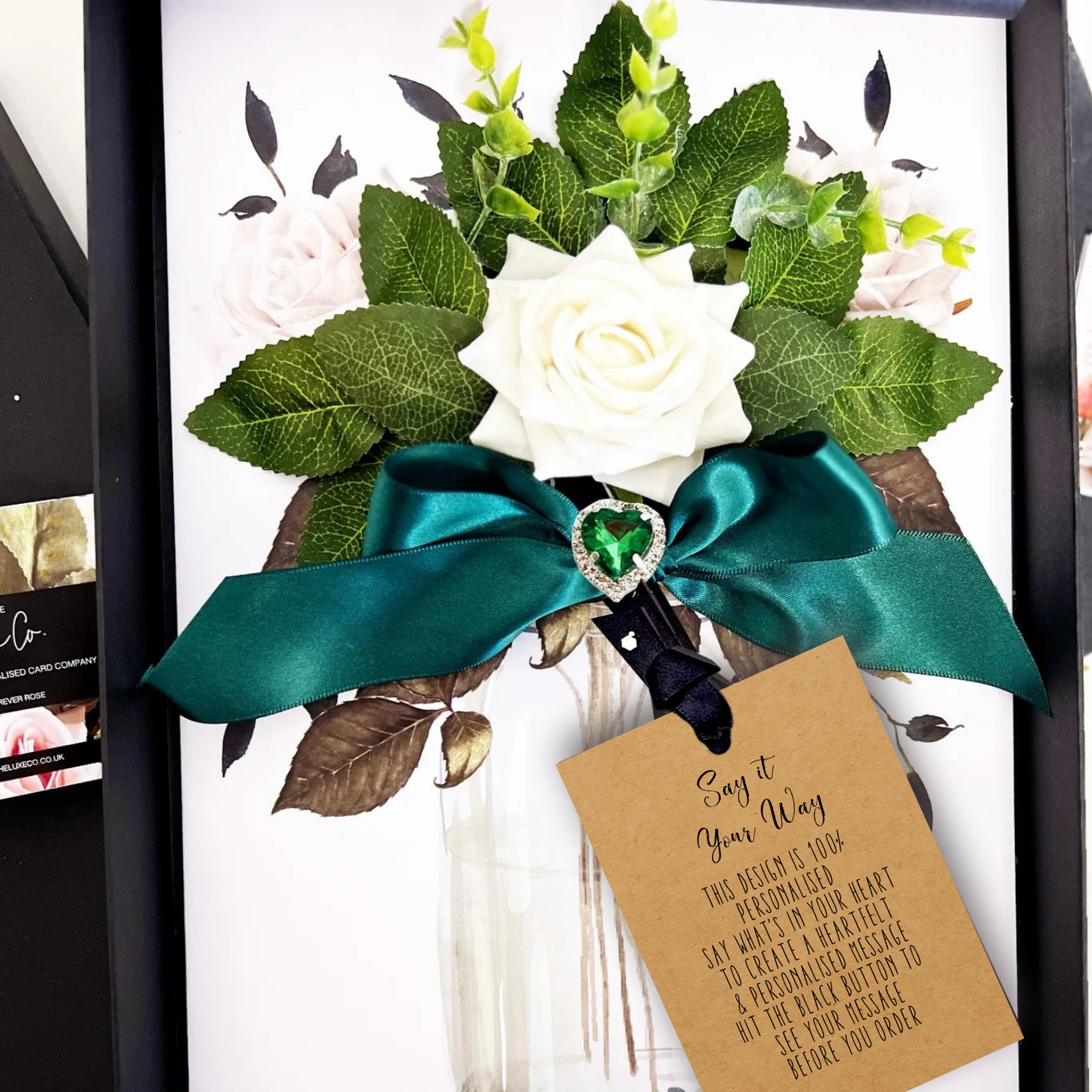 Luxury 55th Anniversary card with emerald crystal heart on scented bouquet