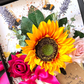 Close up of the beautiful handmade Momma Bloom Personalised Wildflower Birthday Gift Boxed and tied with a massive bow for the ultimate wow factor. Greetings Cards to be felt, smelt and treasured.
