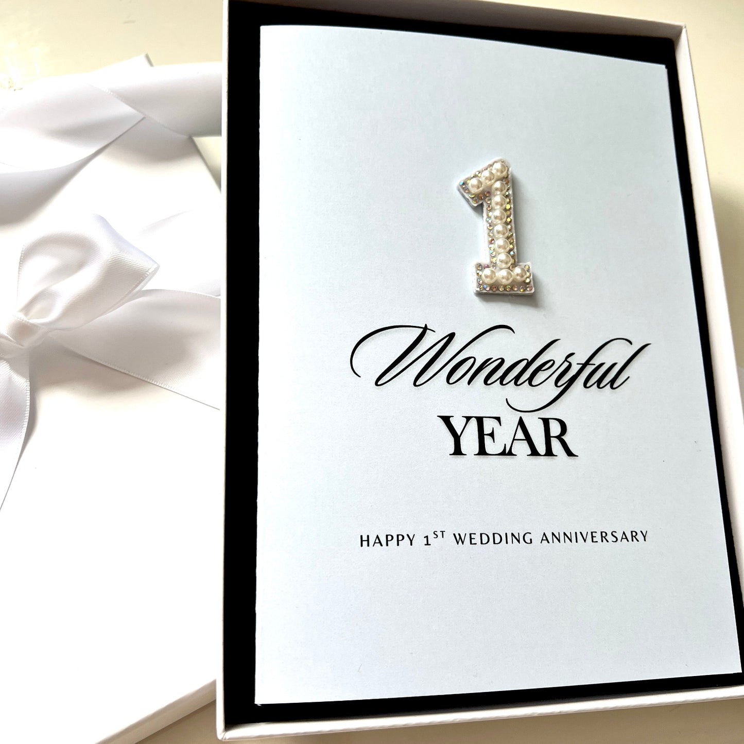 1 Wonderful Year Happy 1st Anniversary Handmade Card on pale blue card with 3d sparkly embroidered number 1 made with pearls and sparkly rhinestones and diamantes by Luxe Cards luxury personalised card company UK