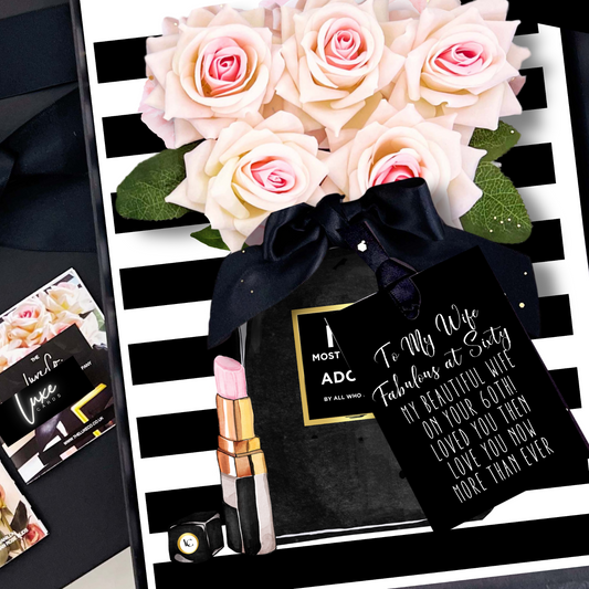 60th Panache wife birthday card Gift set with roses, lipstick, and a card on a black and white striped background