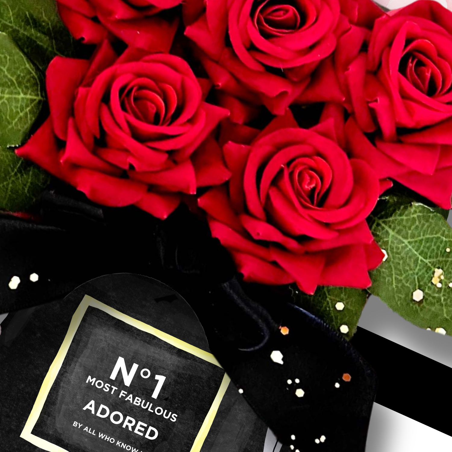 Bouquet of red roses gift with a black box labeled 'No 1 Most Fabulous Adored' on a white background
