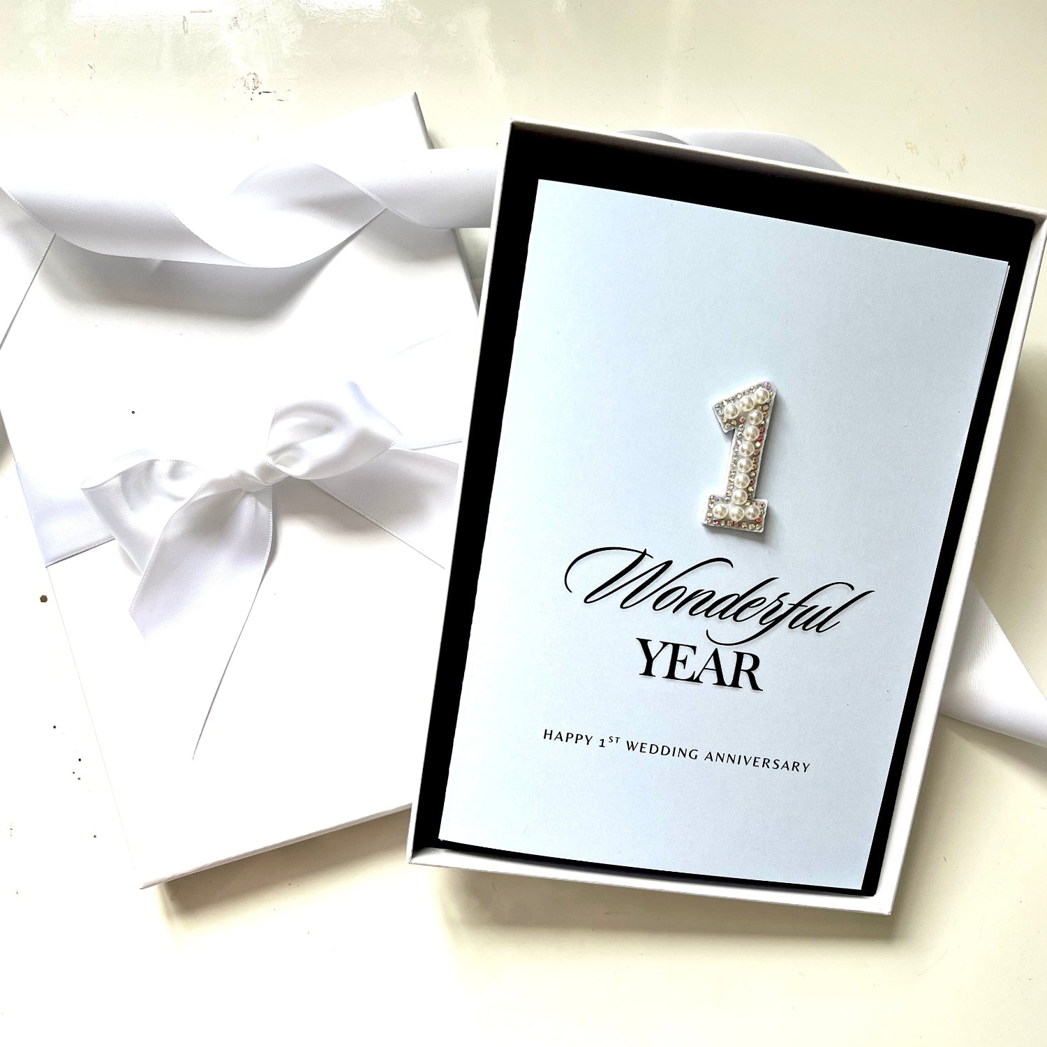 A Wonderful first Year Happy 1st Wedding AnniversaryCard on pale blue cards