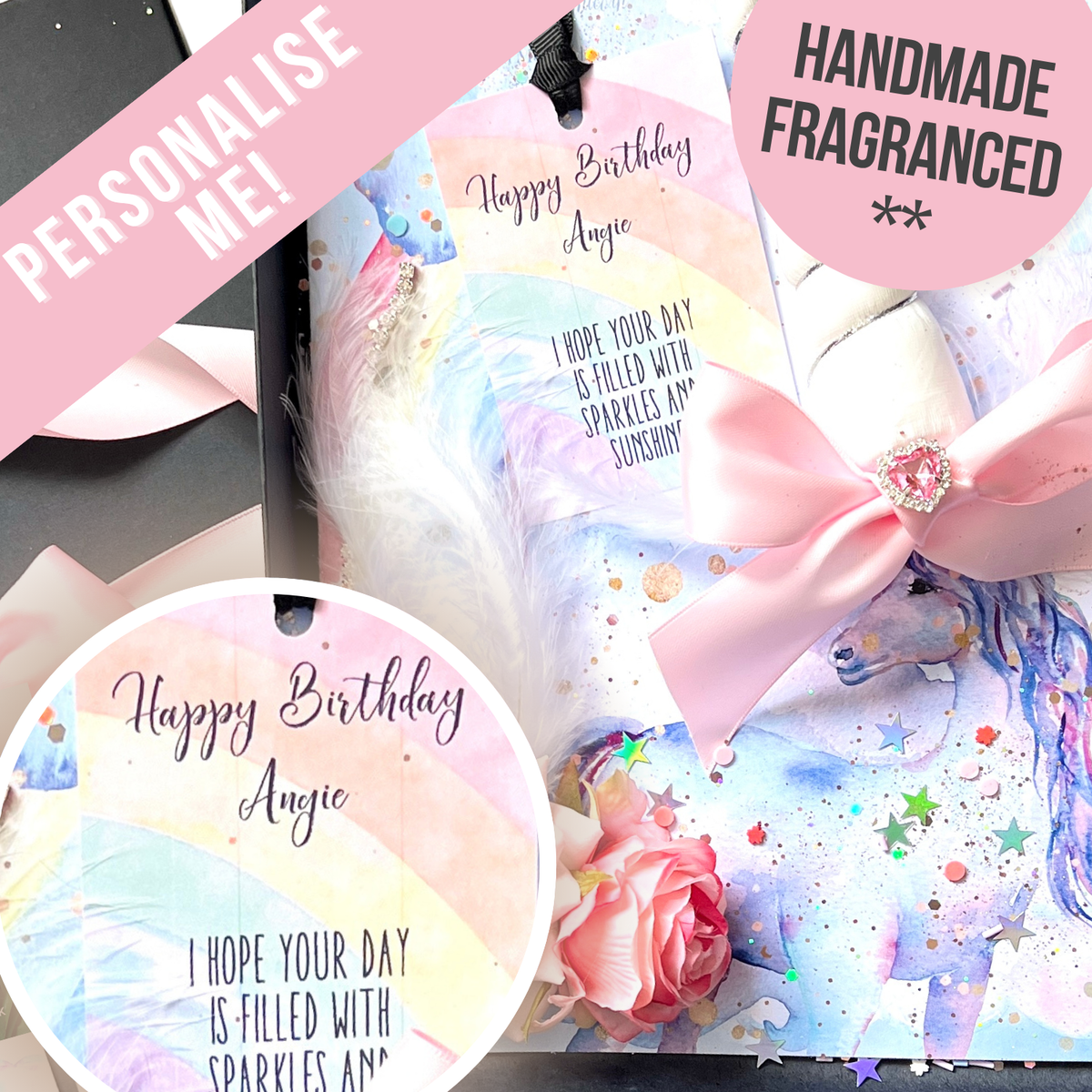 A personalized unicorn birthday gift box set featuring a pastel unicorn-themed card, a pink satin bow, a pink rose, and a round tag with custom text. Handmade & Fragranced with Unicorn Farts