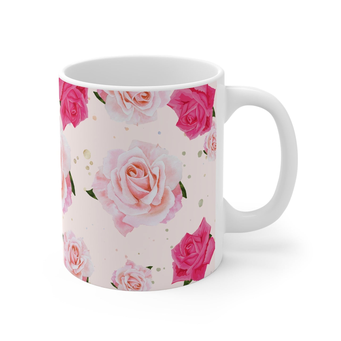 White mug with pink and red rose pattern on a white background
