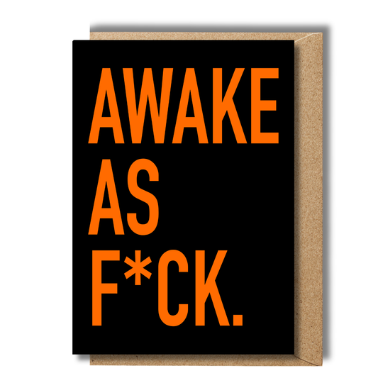 Bold black and orange spiritual birthday card with AWAKE AS F*CK quote and kraft envelope