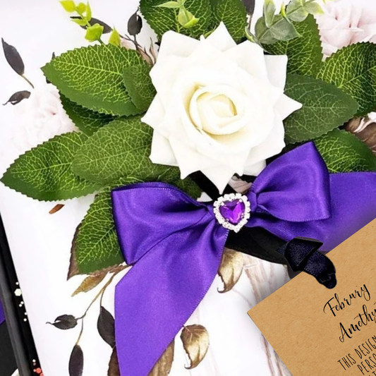 Handmade Amethyst February Birthstones + Flowers Boxed Birthday Gift Card - handcrafted as an everlasting Floral arrangement with a purple bow and heart detail with scented ivory rose that won't die