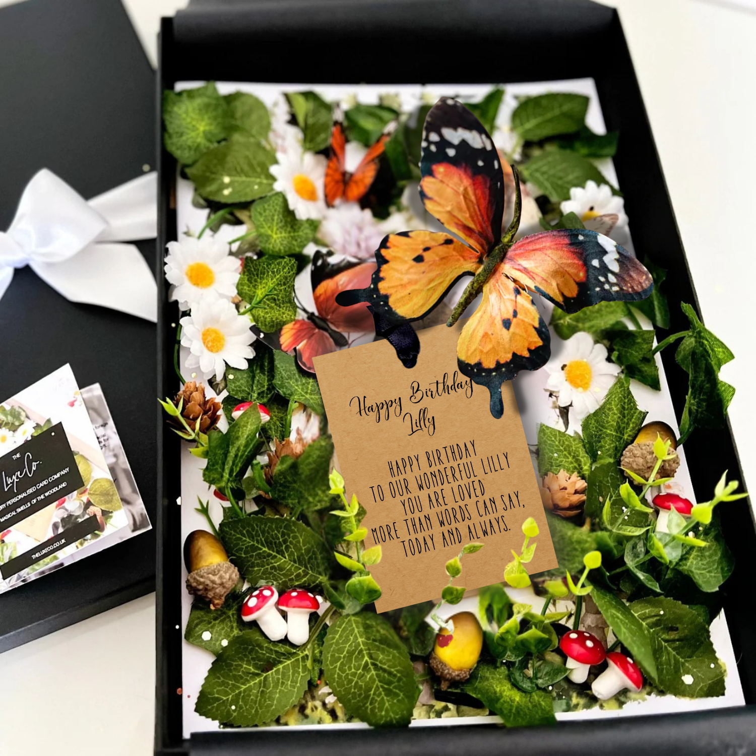 Personalised Butterfly Birthday Card handmade with velvet butterflies, 3d butterflies, silk flowers, and a tag reads 'Happy Birthday Daughter' followed by personal printed message.