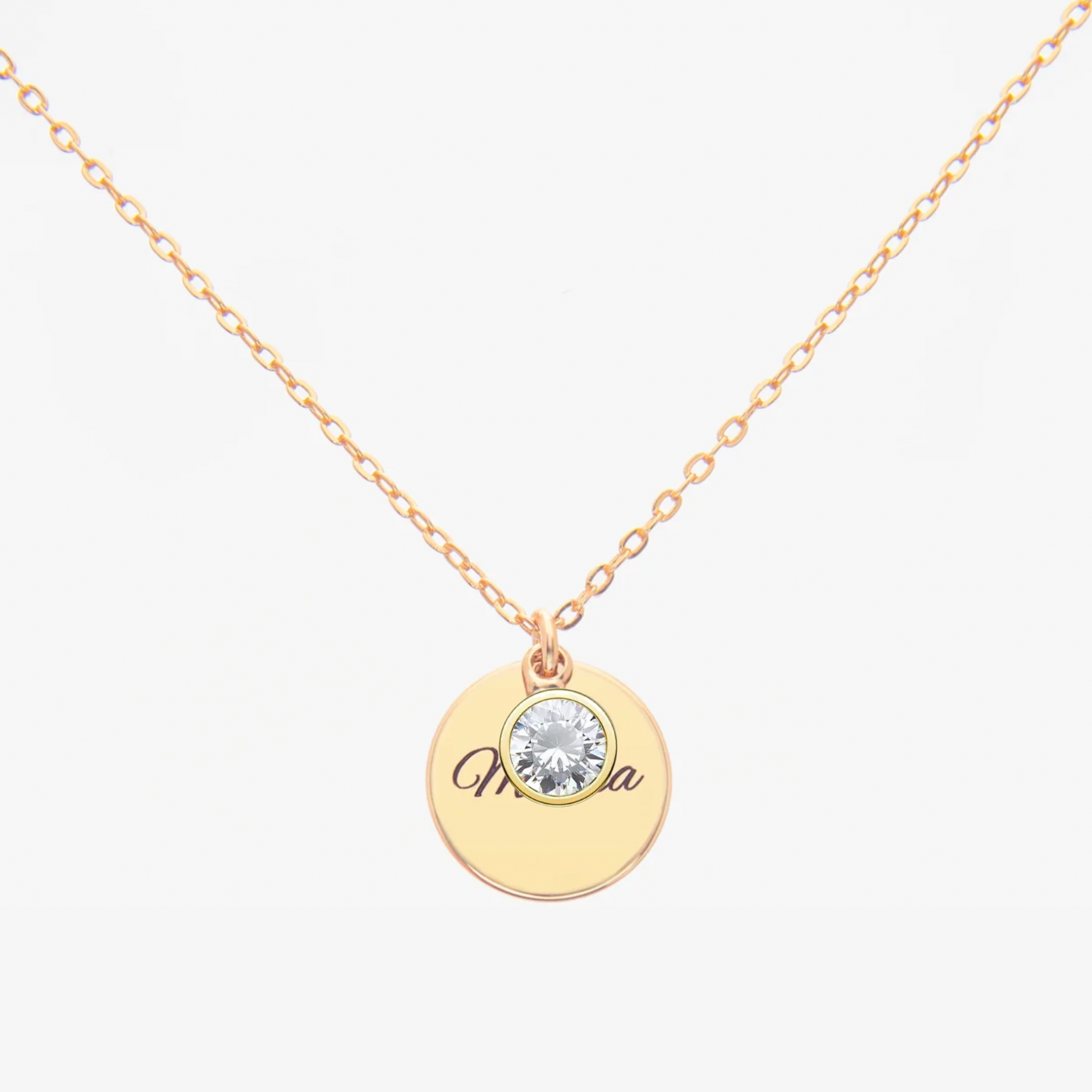 Gold Personalised April Birthstone necklace with a round pendant featuring a diamond (birthstone for April) and personalized engraved text on a white background