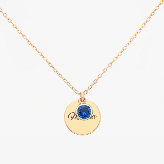 Gold Personalised Sapphire Birthstone necklace with a round pendant featuring a Sapphire (birthstone for September) and personalized engraved text on a white background