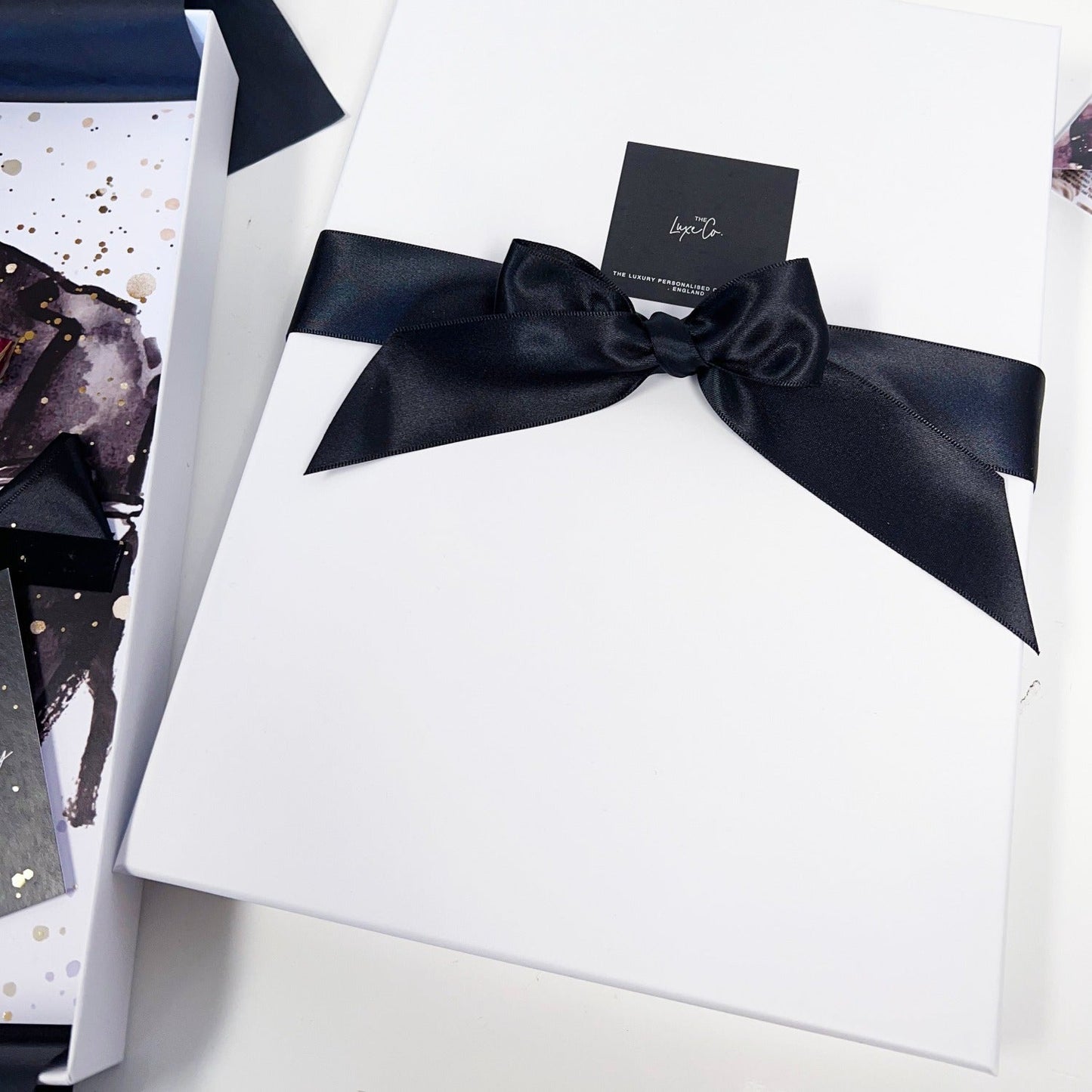 White Gift box with black bow for mens luxury personalised suited booted card | The Luxe Co